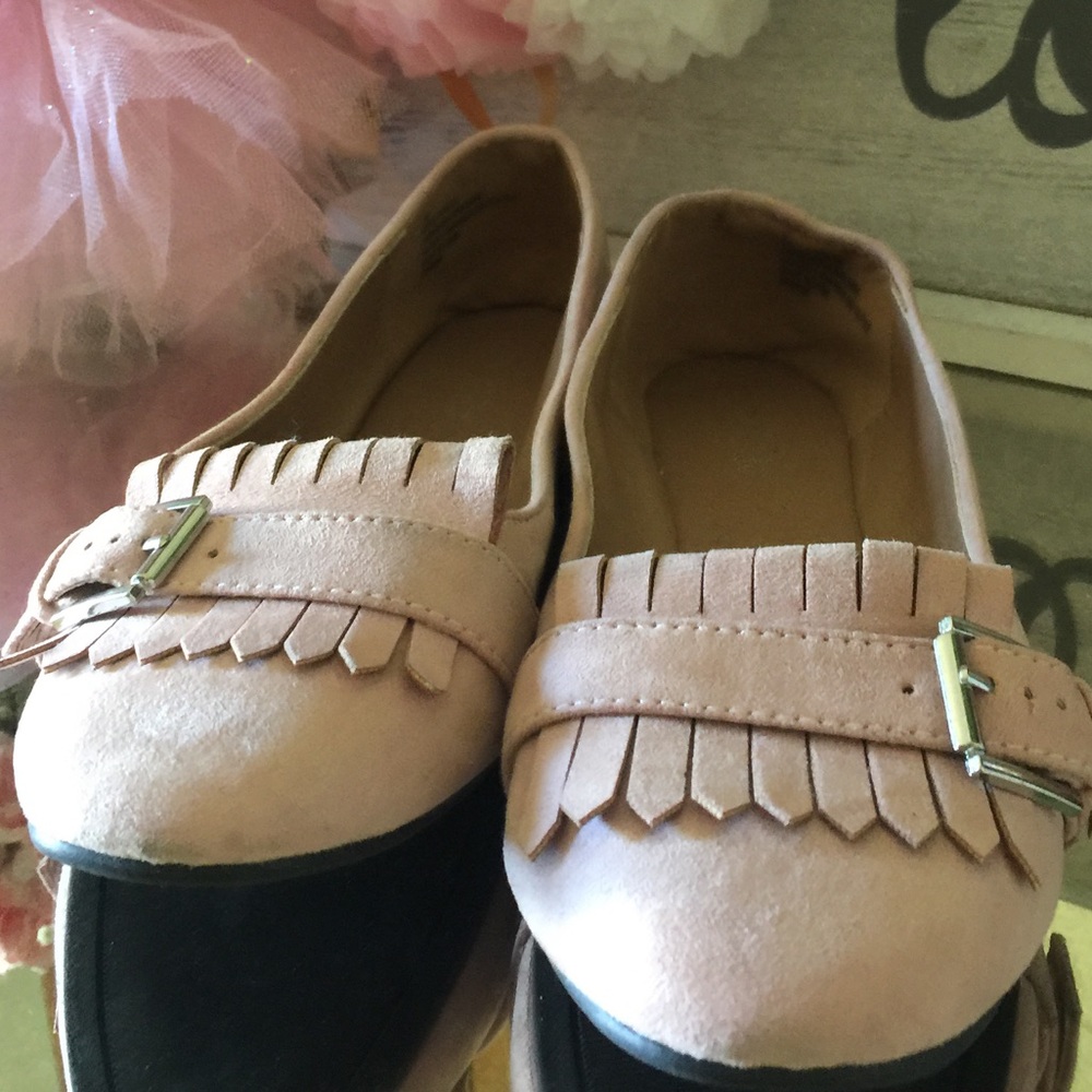 A pale pink leather suede loafers